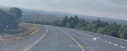 photo of a wide road in African landscape